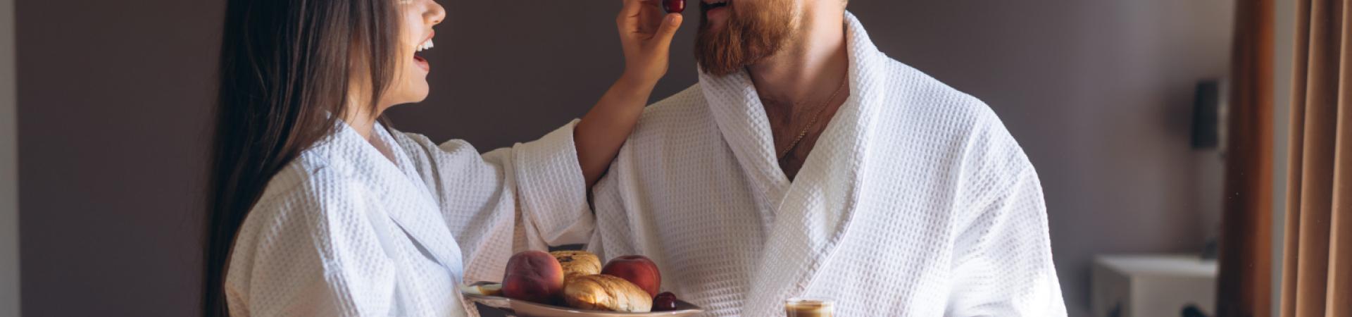 guy-girl-bathrobe-girl-feeds-guy-fruit (1)