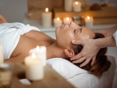 young-woman-having-face-massage-relaxing-spa-salon